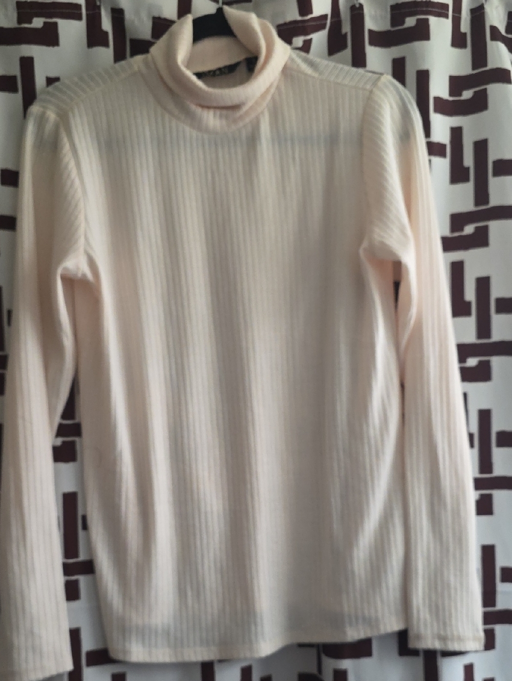 IMAN Cream Ribbed Turtleneck Top